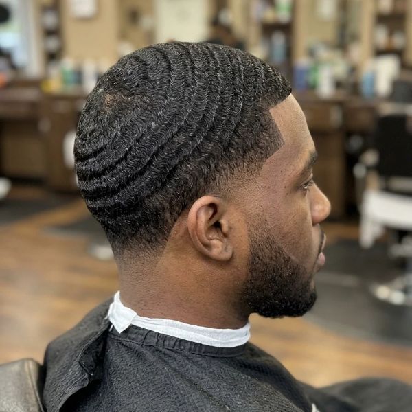 Low taper fade with waves